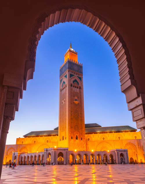 Casablanca is a port city and commercial hub in western Morocco, fronting the Atlantic Ocean. The city's French colonial legacy is seen in its downtown Mauresque architecture, a blend of Moorish style and European art deco. Standing partly over the water, the enormous Hassan II Mosque, completed in 1993, has a 210m minaret topped with lasers directed toward Mecca.